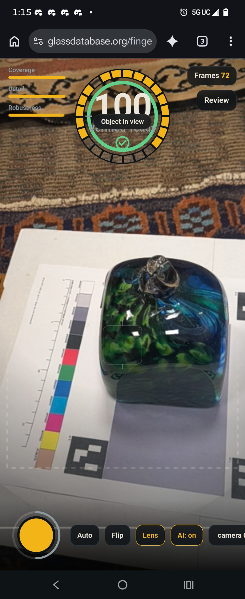 A glass piece on the printed Photo Mat, being photographed from every angle